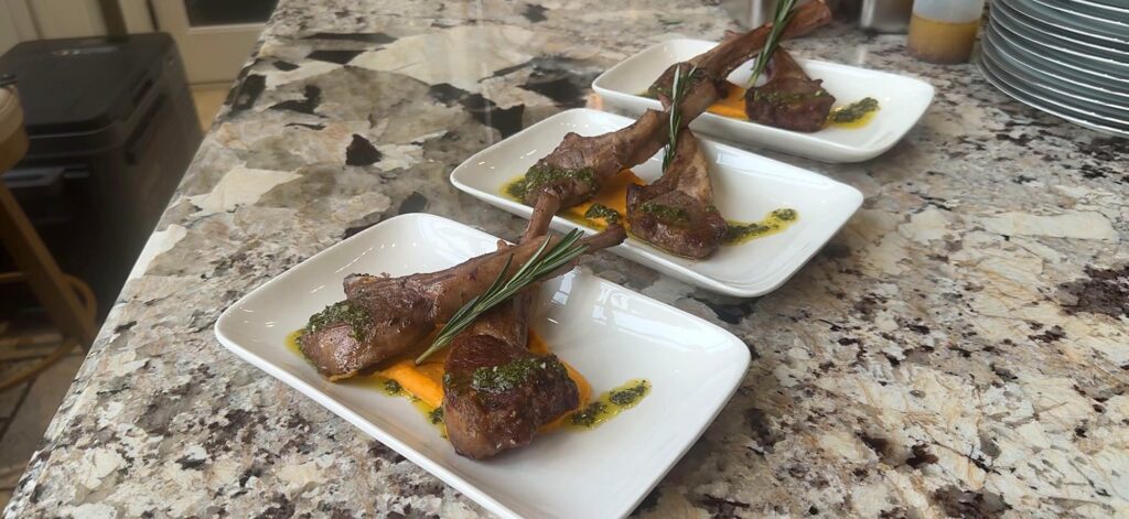 Rosemary lamb chops with squash puree and salsa verde plated by a private chef in Barrie, Ontario